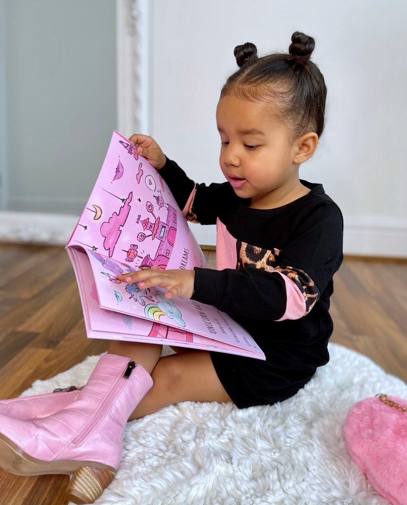 Lynnie is two years old on this photo and she was reading her favourite book.