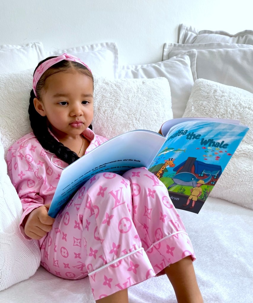 Lynnie is reading her new book, Louisa the Whale.